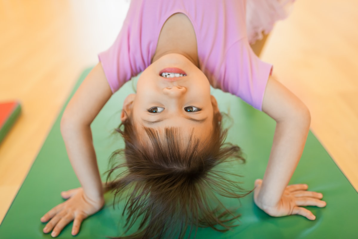 Yoga instructor demonstrating a flexible pose